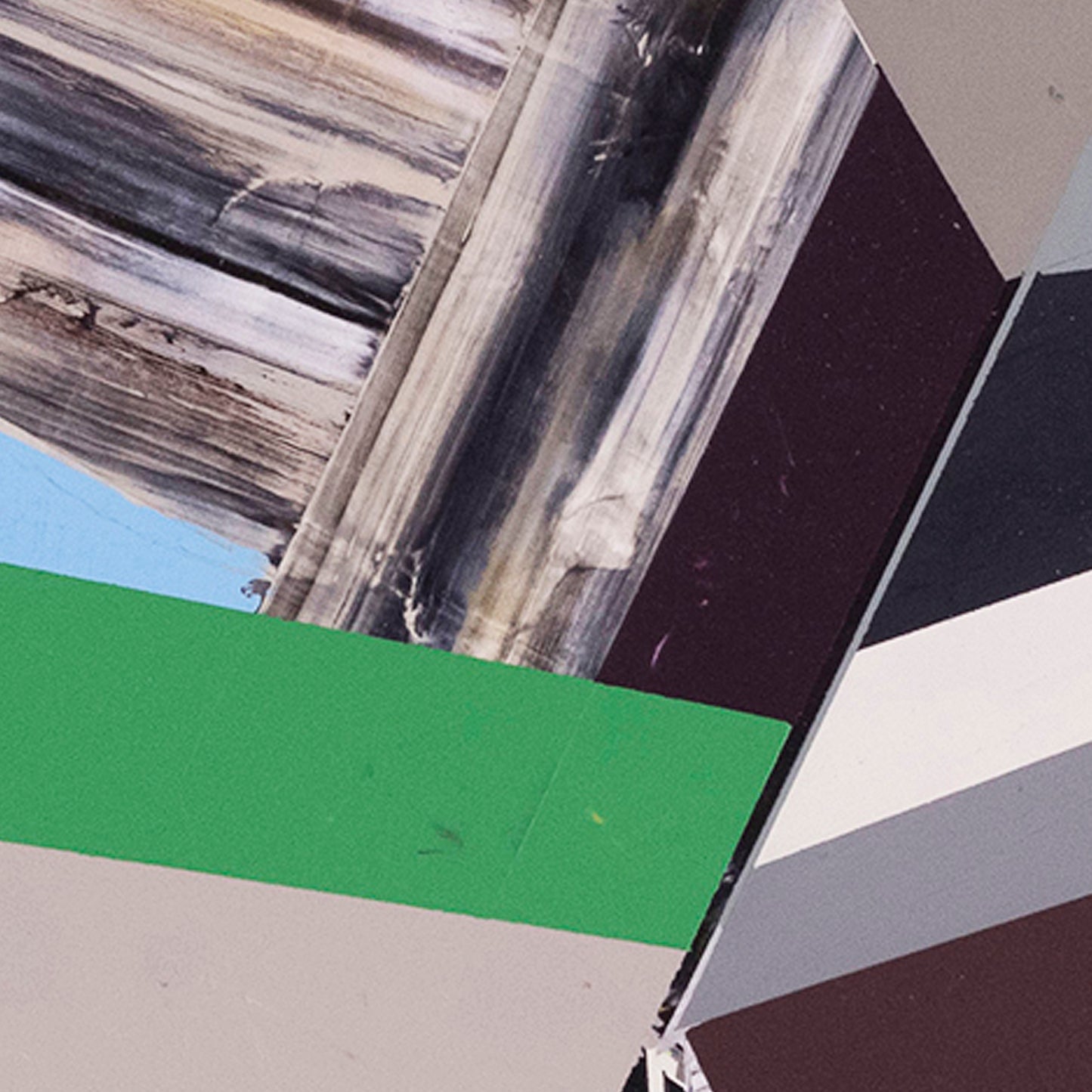 Detail of abstract art piece with geometric shapes and colors