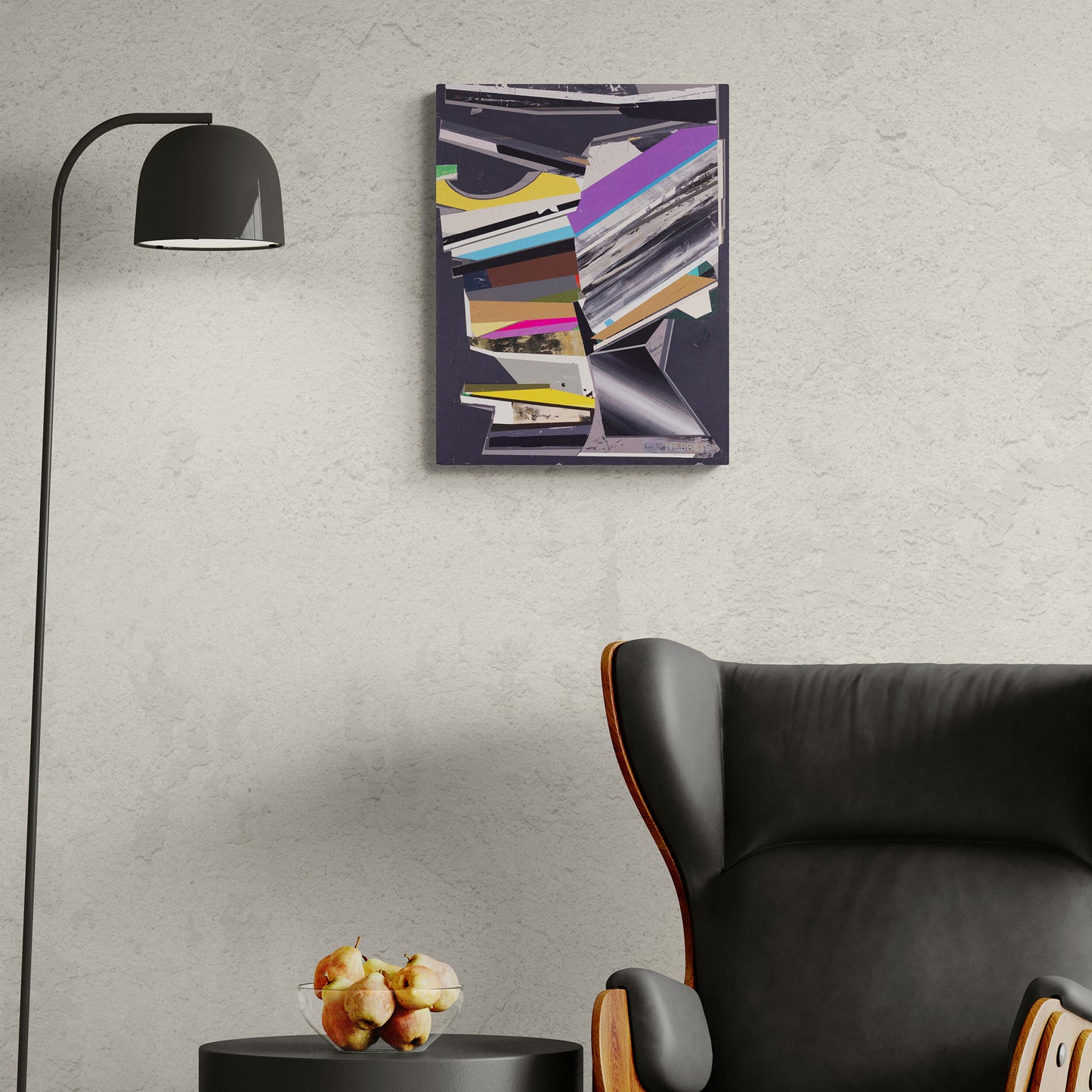 Abstract painting on a wall above a black chair and small table with decorative items.