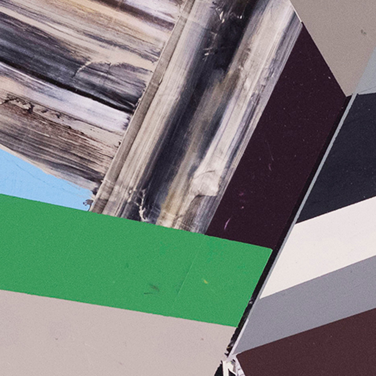 Detail of abstract art piece with geometric shapes and colors