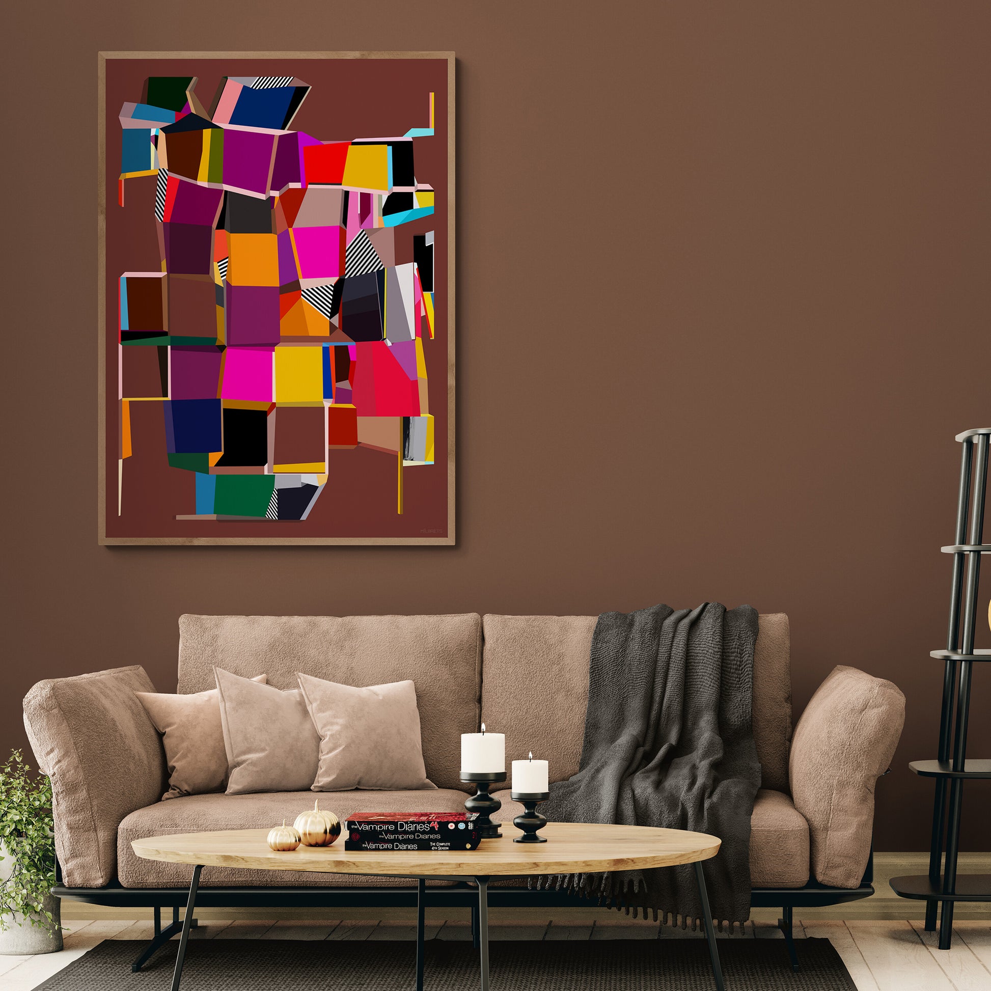 Living room with  a large vibrant geometric abstract canvas print on the wall, beige sofa, and a wooden coffee table.