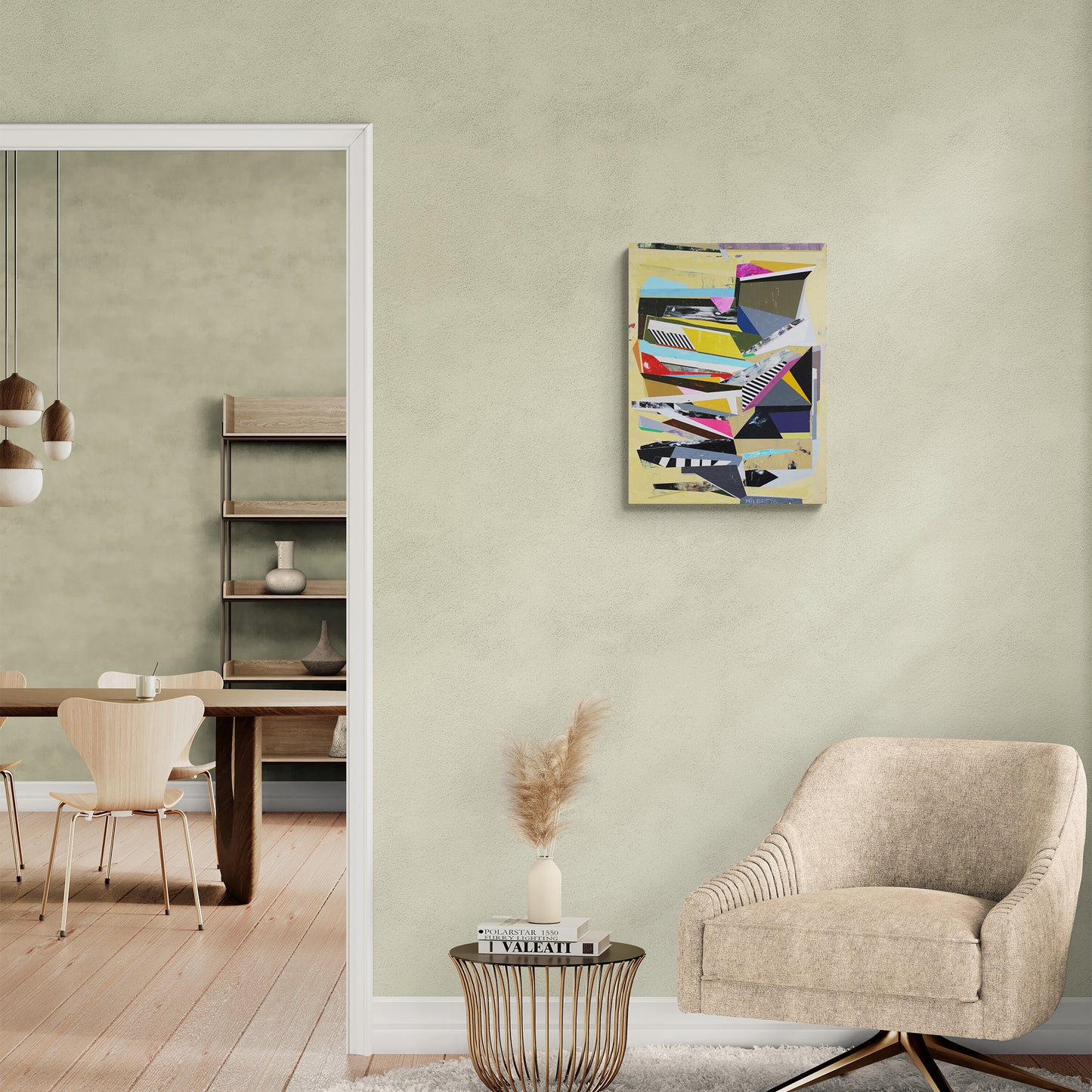 Modern living room with a beige armchair, side table, and abstract art on the wall.