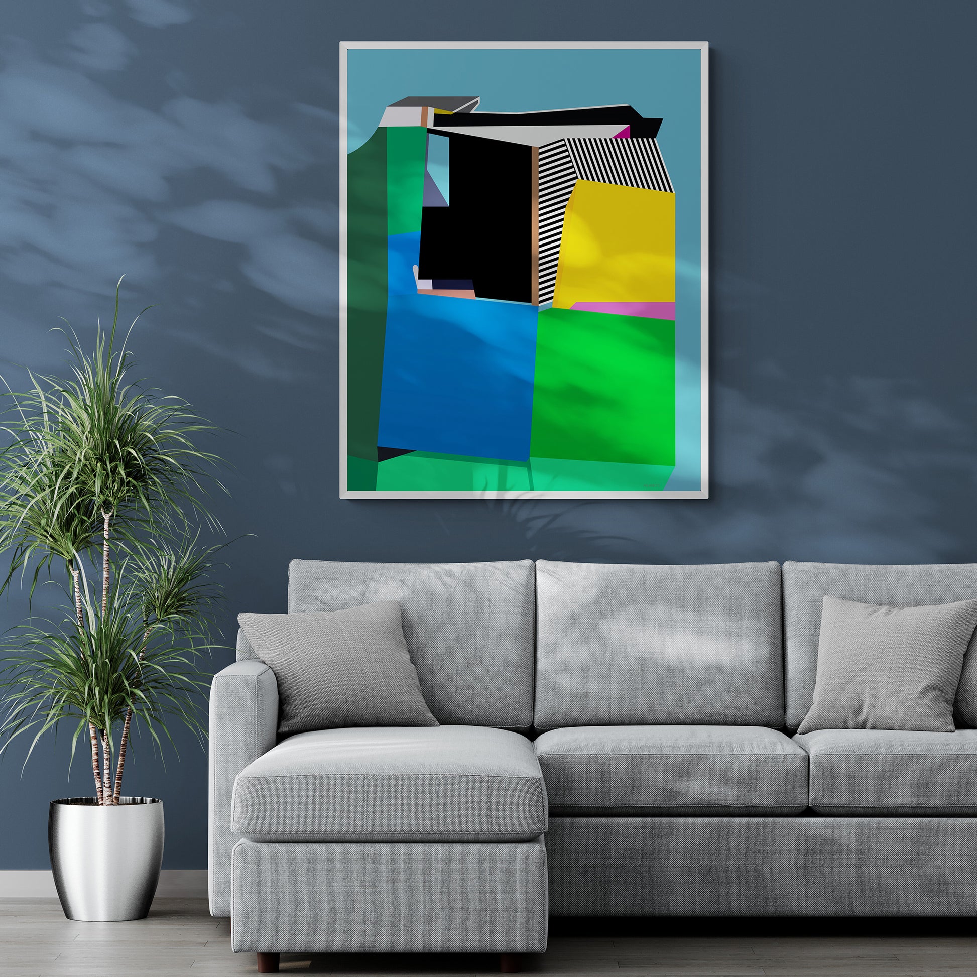 Gray sectional sofa in a room with a colorful abstract painting on the wall.