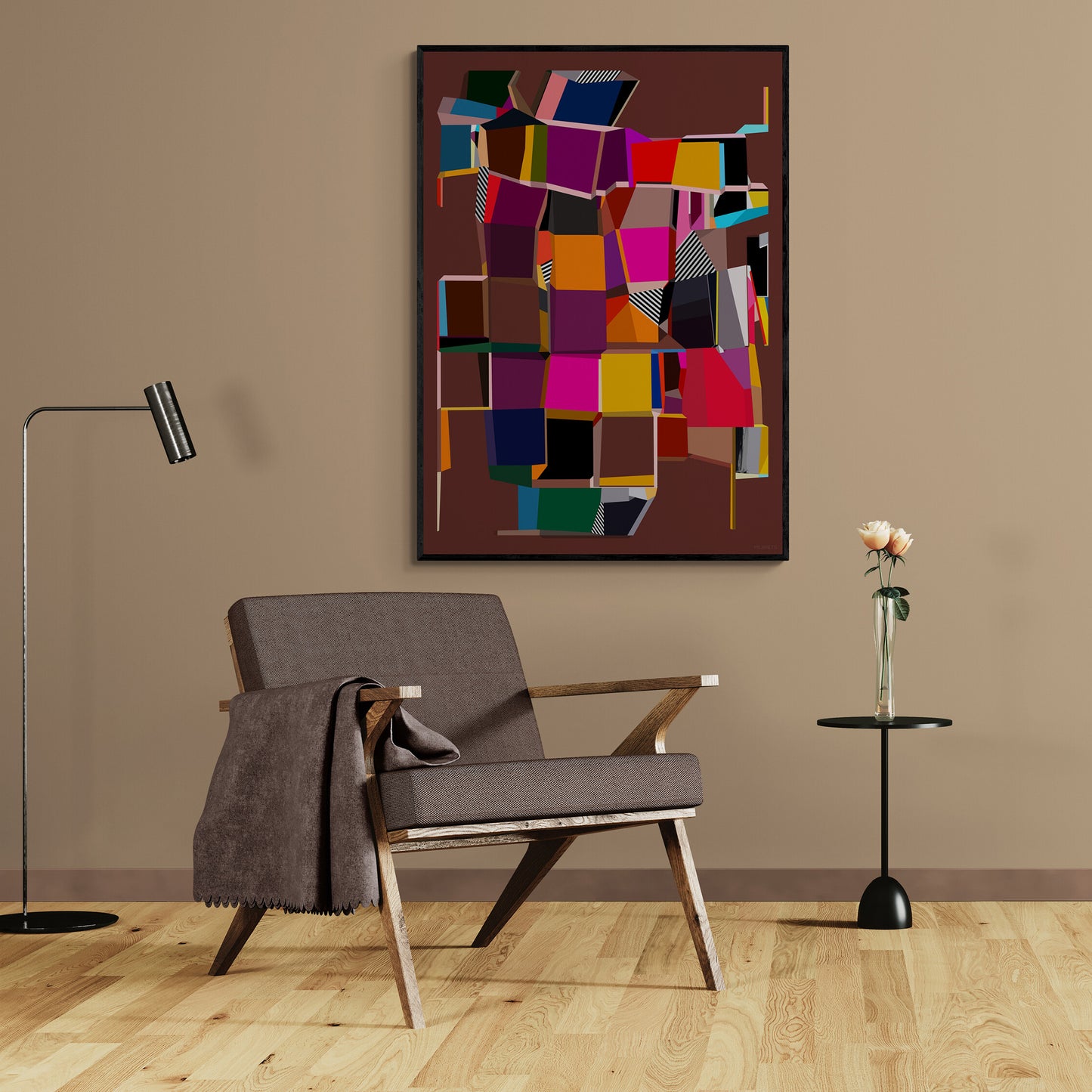 Modern living room with a gray armchair, vibrant abstract art on the wall, and a small table with a vase.