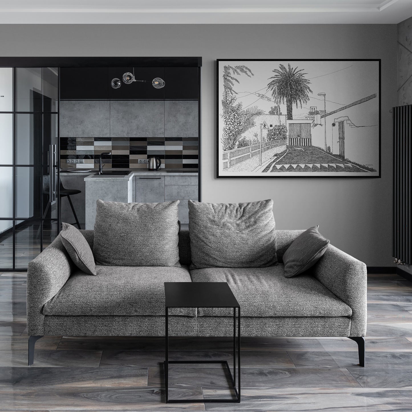 Modern living room with a gray sofa, coffee table, and tropical wall art.
