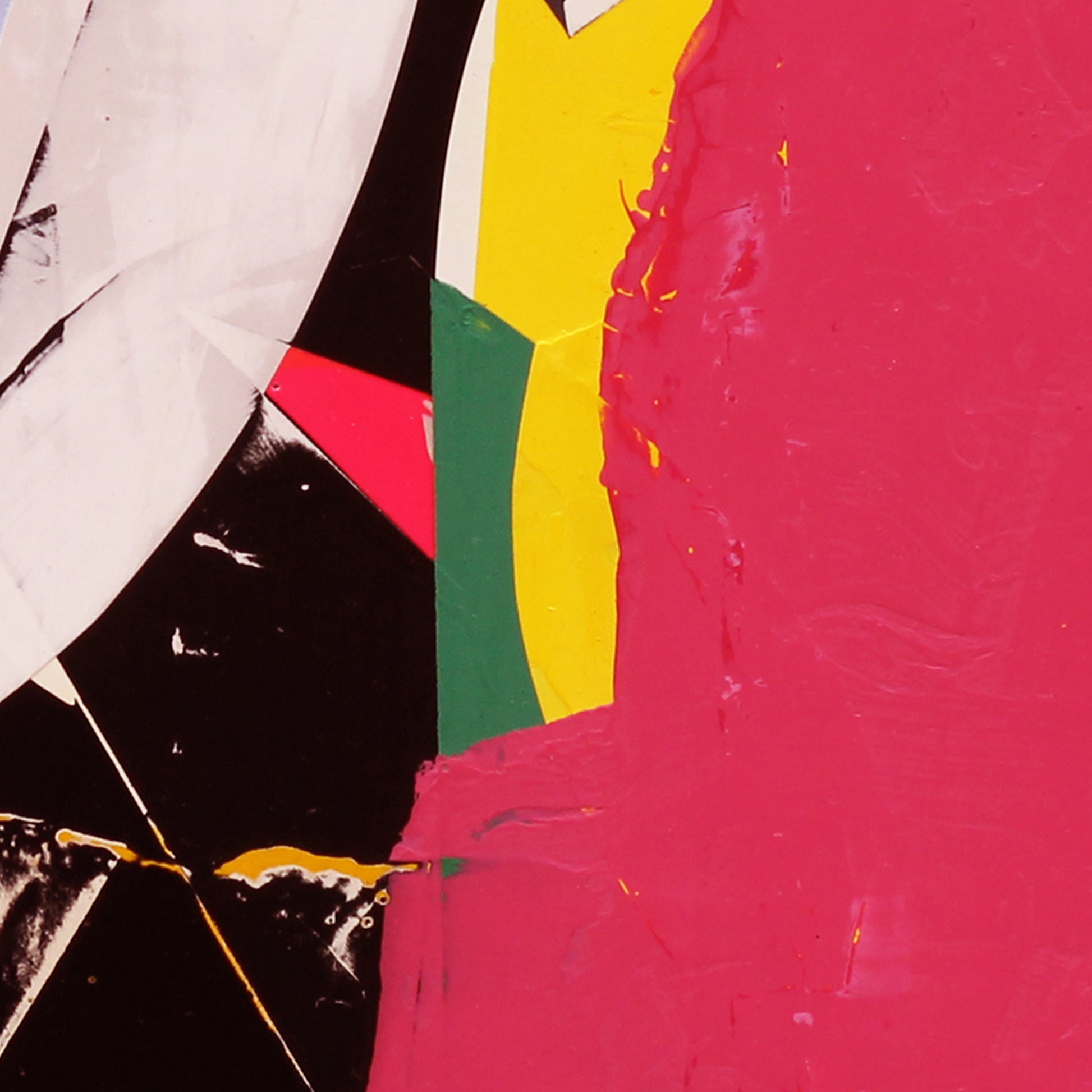 Detail of an abstract art piece with geometric shapes in black, yellow, green, and red on a pink background
