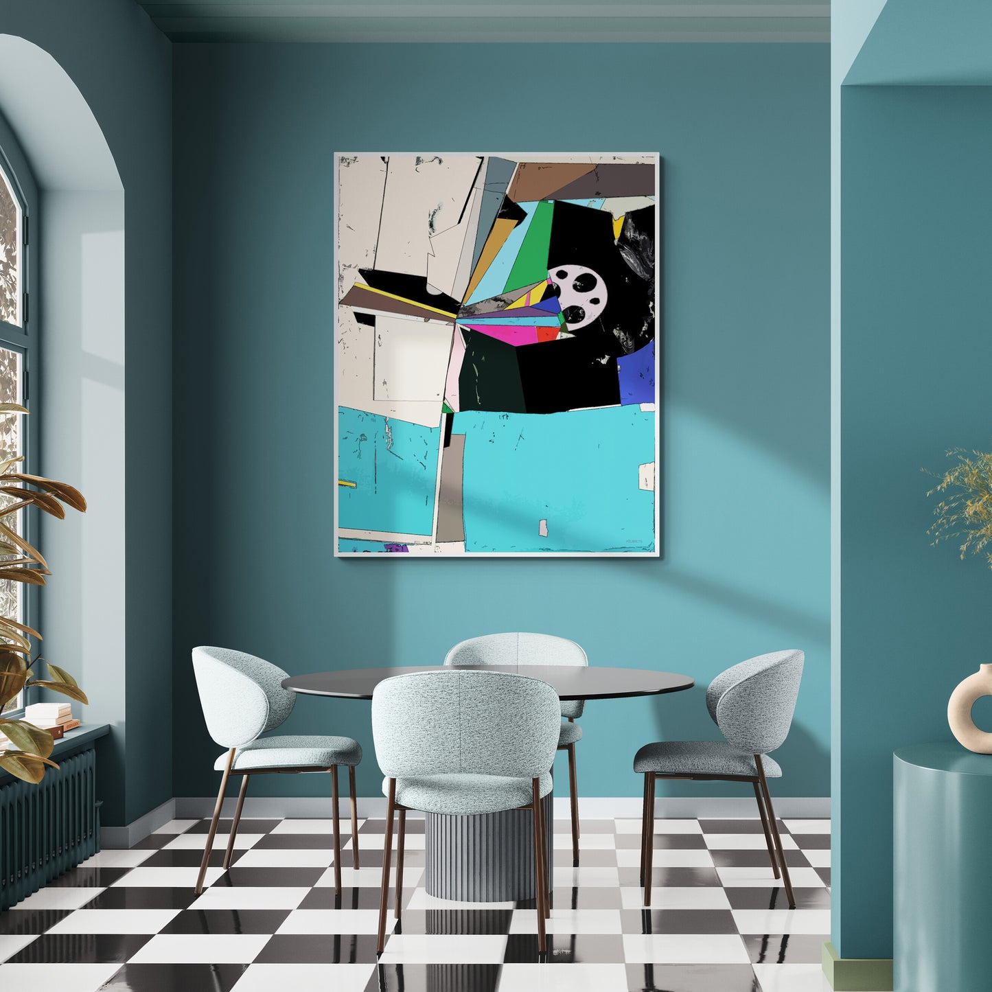A framed abstract geometric wall art print hangs on a teal wall above a dining table and chairs in a modern room with a black-and-white checkered floor.