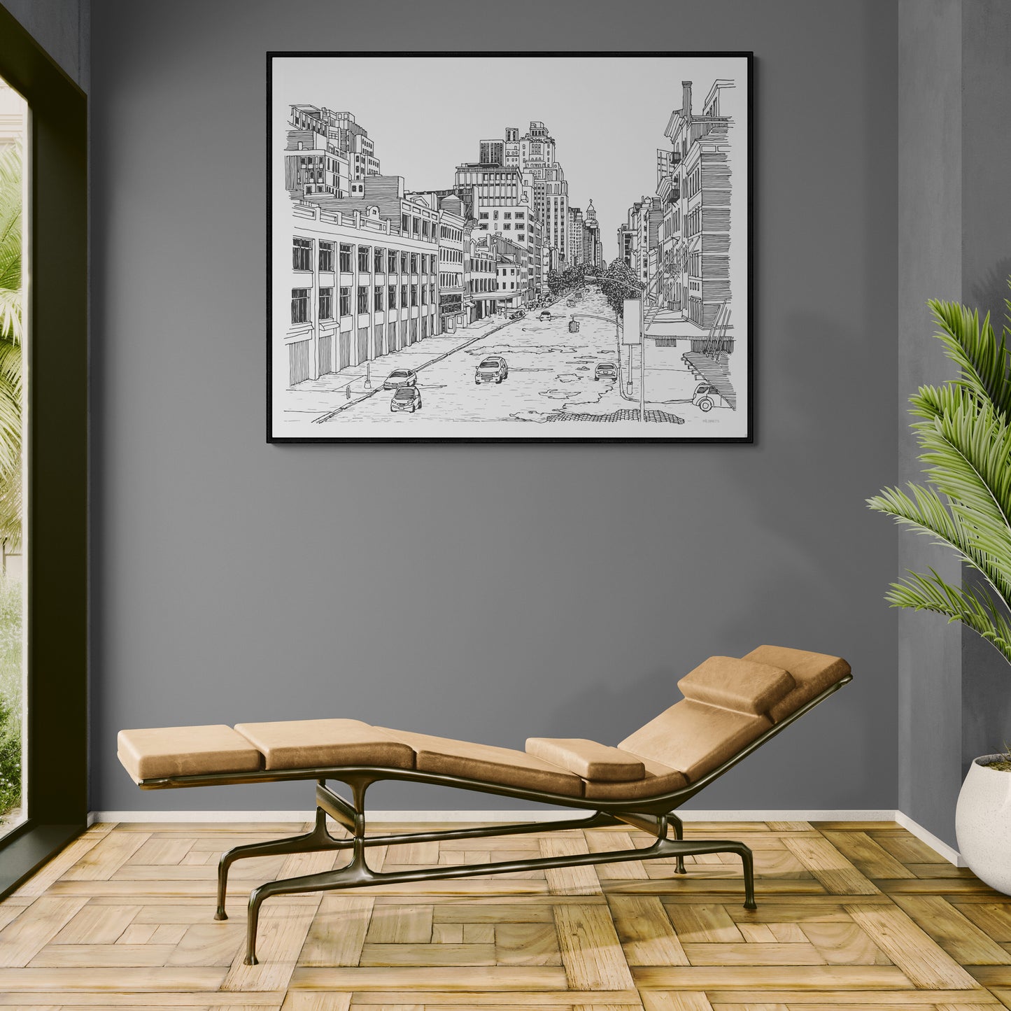 Modern room with a chaise lounge, framed cityscape drawing on the wall, and a plant.
