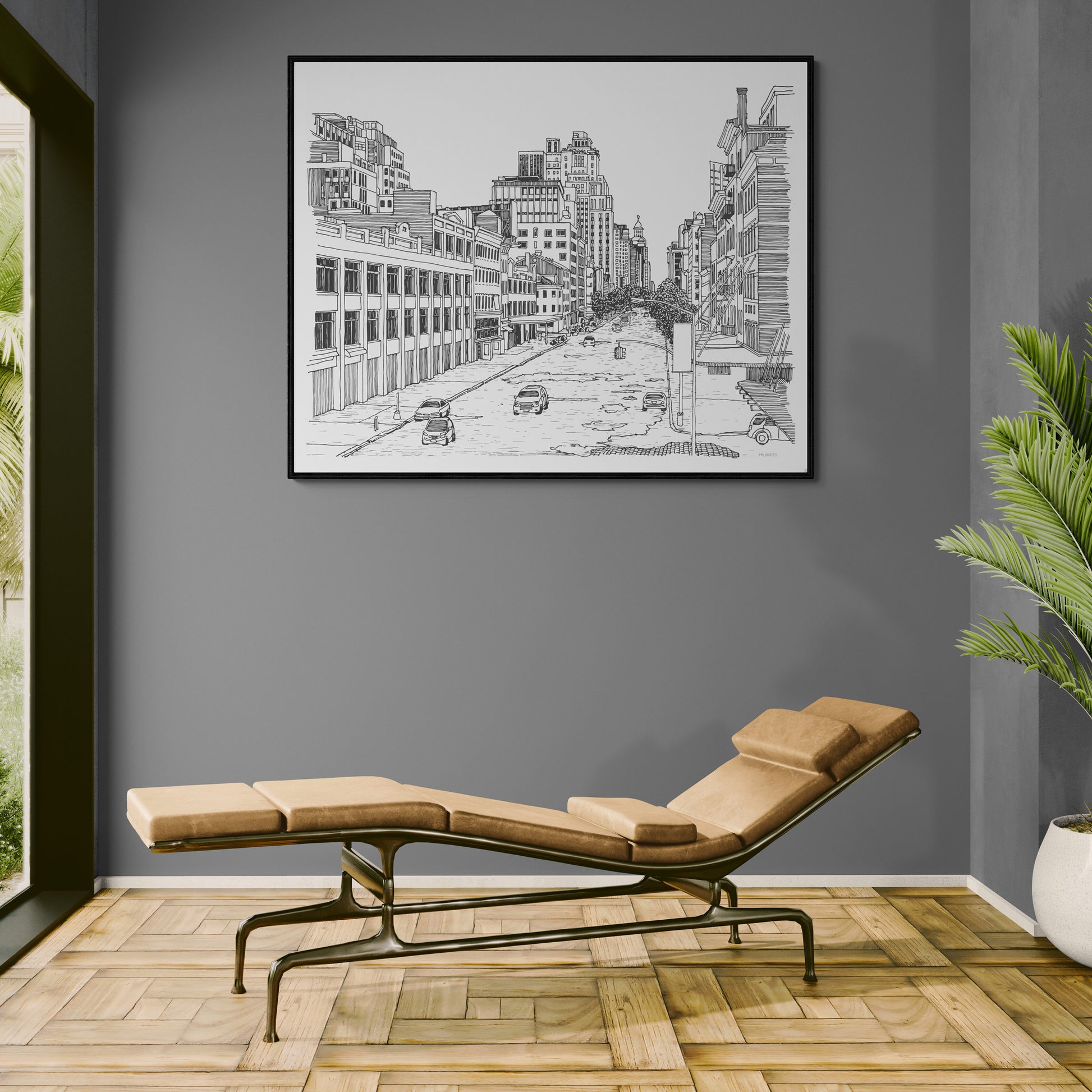 Modern room with a chaise lounge, framed cityscape drawing on the wall, and a plant.