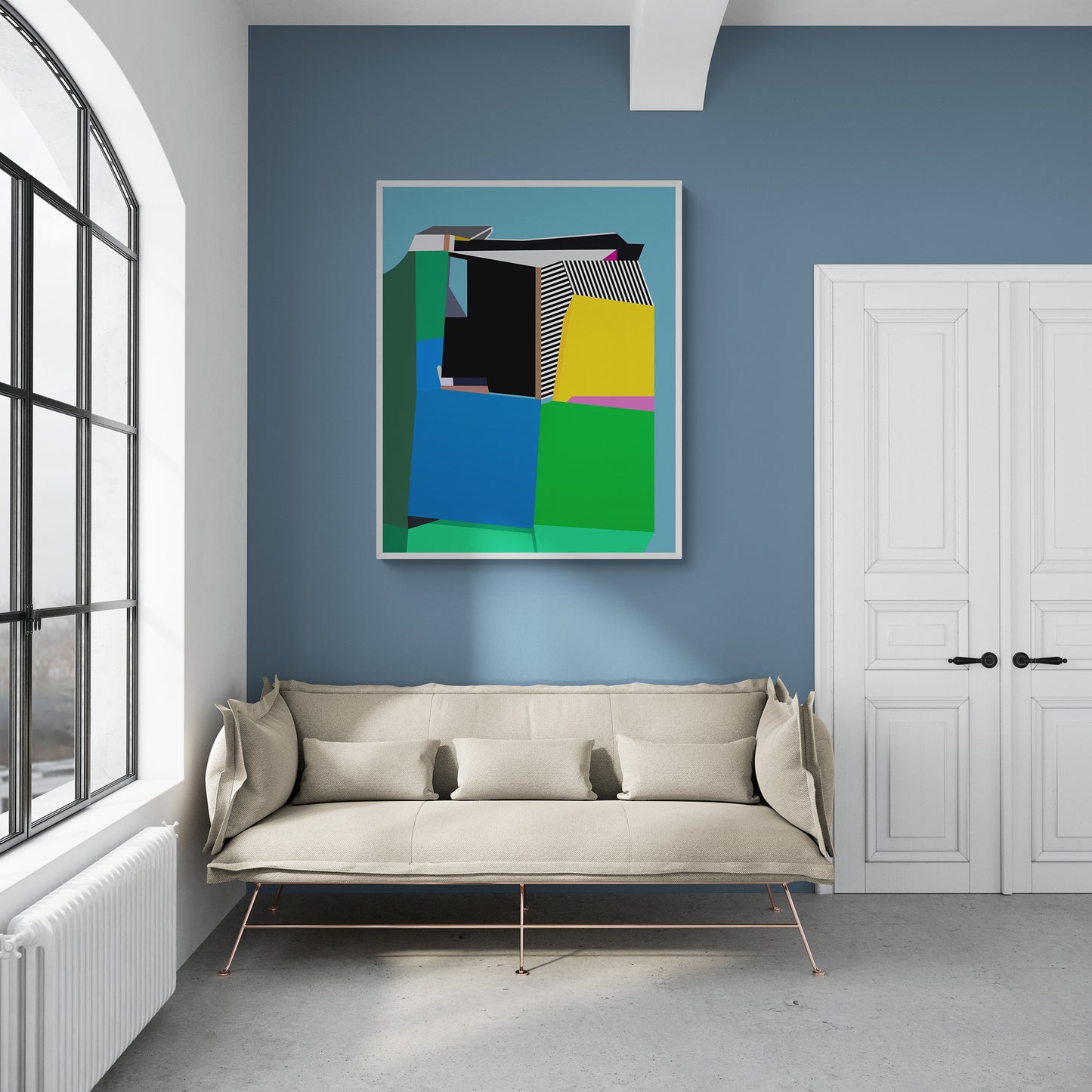 Modern living room with a beige sofa, abstract art on the wall, and a white door.