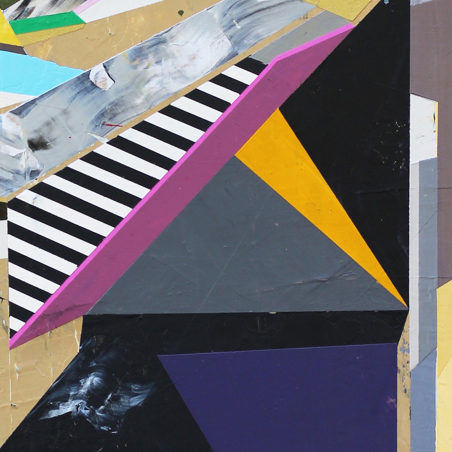 Detail of an abstract art piece with geometric shapes and bold colors